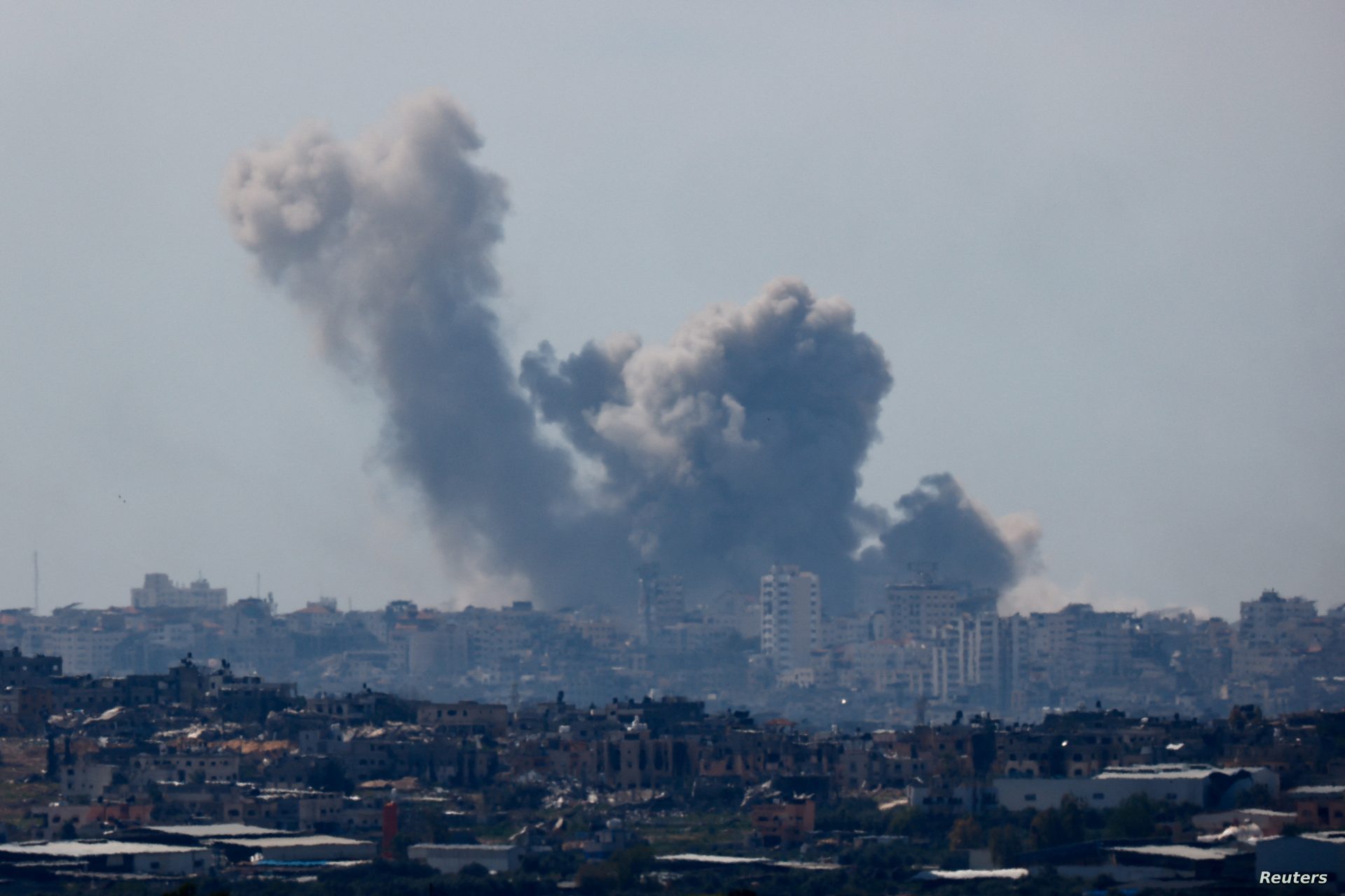 Smoke rises from Gaza during an explosion, as seen from Israel